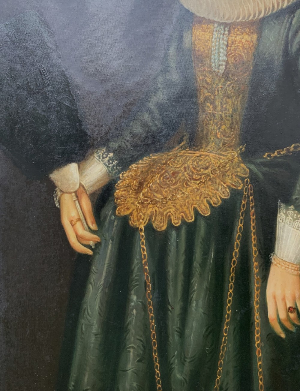 A pair of large framed full-length oil portraits depicting a lady in a dark green gown and a gentleman in a black doublet, both wearing pleated ruff collars. View IX
