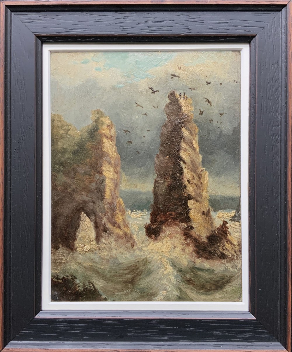 A 19th-century miniature oil painting depicting coastal rock formations in sea swell, set within a dark wooden frame with a white slip.