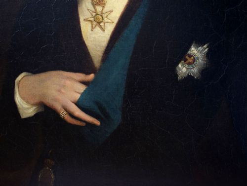 fig 2. A Victorian portrait oil painting depicting Prince Albert wearing a dark coat, white neckcloth, red ribbon, and honours against a dark brown background.