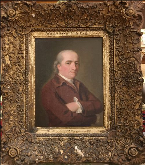 fig 1. An 18th-century oil portrait painting depicting a gentleman with folded arms wearing a brown coat against an olive background.