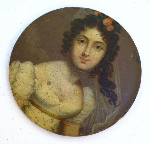 fig 1. A circular Regency-era portrait painting depicting a woman with dark curly hair wearing a white gown with puff sleeves and flowers in her hair.