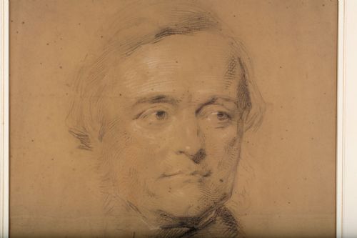 fig 2. A monochromatic Victorian portrait sketch in black chalk on warm brown paper depicting a gentleman in three-quarter profile.