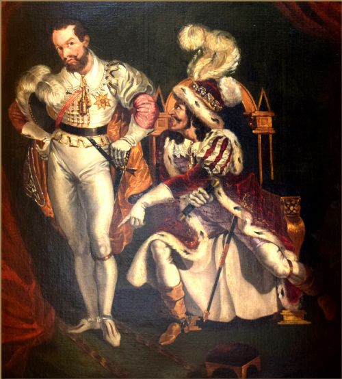 fig 1. An oil painting depicting two men in elaborate 19th-century theatrical costumes, with one seated wearing a feathered cap and the other standing in a white doublet against red drapery.