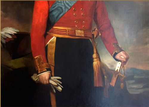 fig 3. An early nineteenth-century oil portrait of a military officer standing in a scarlet coat with gold epaulettes, a blue sash, and military decorations.