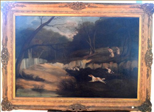 fig 4. An eighteenth-century style oil painting depicting two sportsmen and three spaniels pheasant shooting in a wooded landscape.