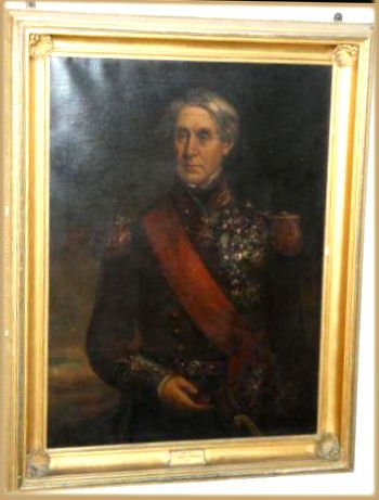 fig 2. A 19th-century oil painting depicting Admiral Edmund Lyons in a dark naval uniform with gold epaulettes, military medals, and a red sash.