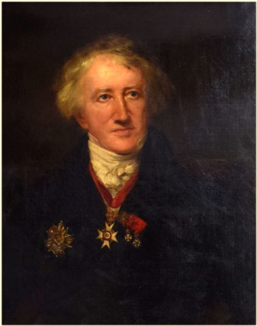 fig 4. An antique oil painting on canvas depicting a seated gentleman with white hair wearing a dark coat decorated with medals, holding a green book beside a red-draped table.