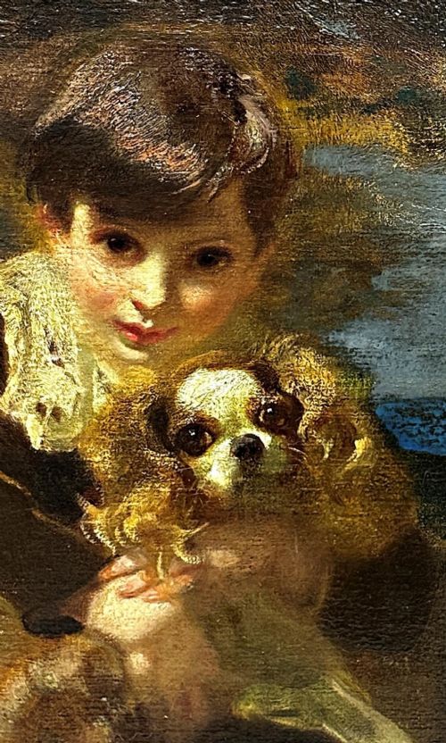 fig 3. An oil painting depicting a young boy in a dark garment with a white lace collar embracing a Cavalier King Charles Spaniel.
