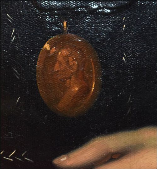 fig 2. An antique oil portrait on canvas showing a half-length depiction of a man in dark clothing with a star decoration against a crimson background.