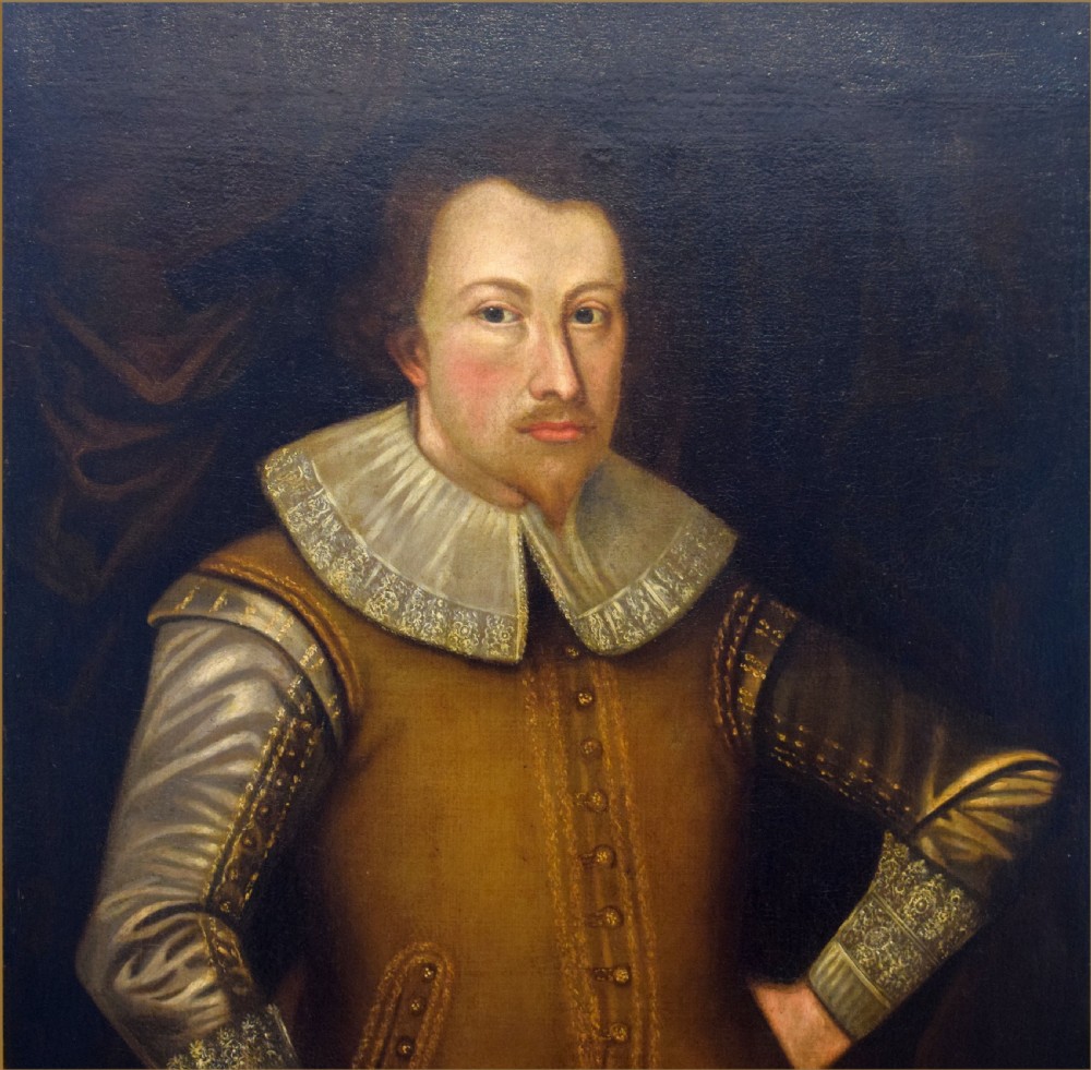 An oil portrait on canvas depicting a Tudor gentleman wearing an embroidered brown doublet with a white lace collar and detailed cuffs. View III
