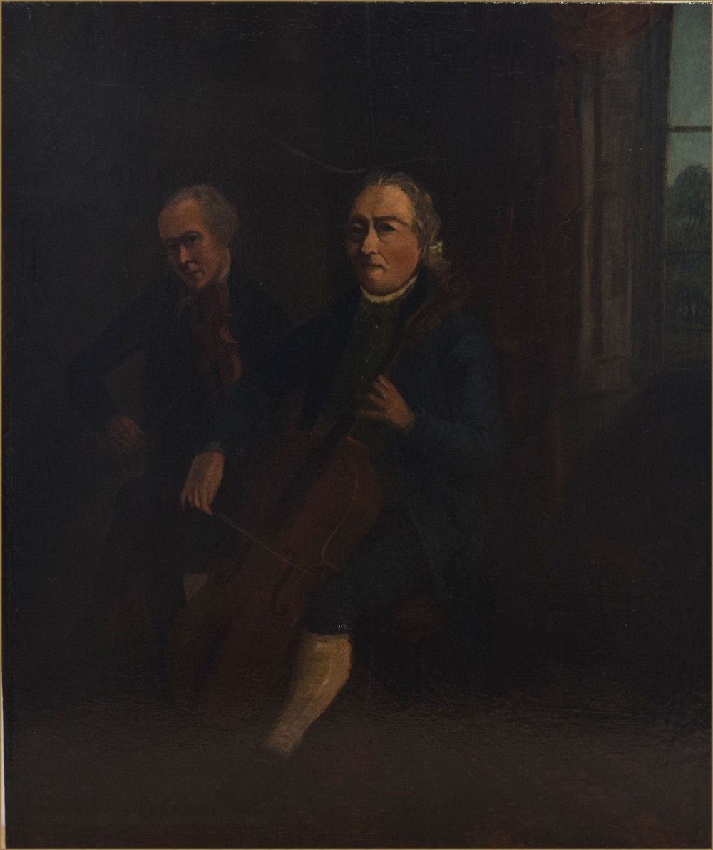 An 18th-century oil painting on panel depicting two male musicians in period dress playing a cello and violin in a dimly lit interior.