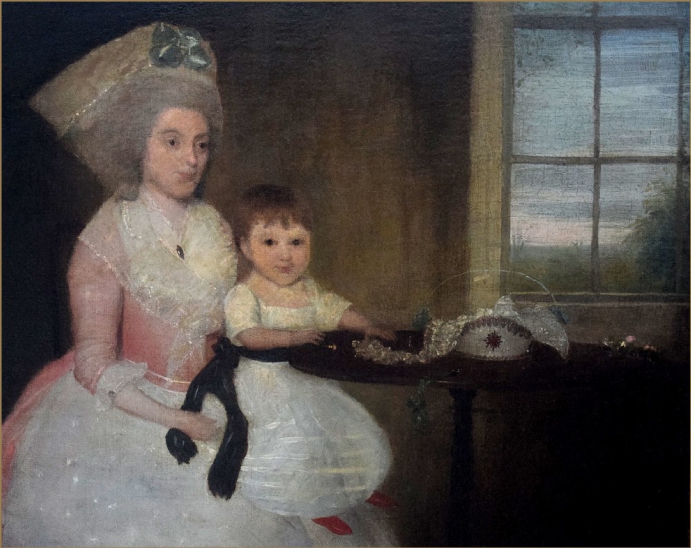 An 18th-century oil painting depicting a mother in a pink dress and high bonnet seated with her young child beside a table and multi-pane window.