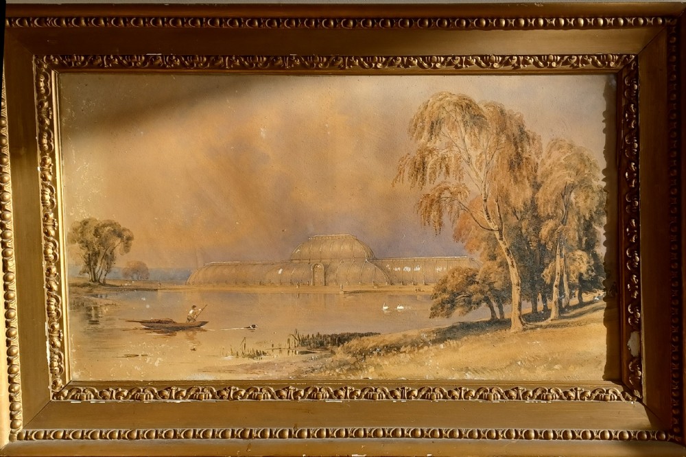 A 19th-century sepia watercolour painting depicting the Palm House at Kew Gardens across a body of water with trees and a figure in a small boat. View VI