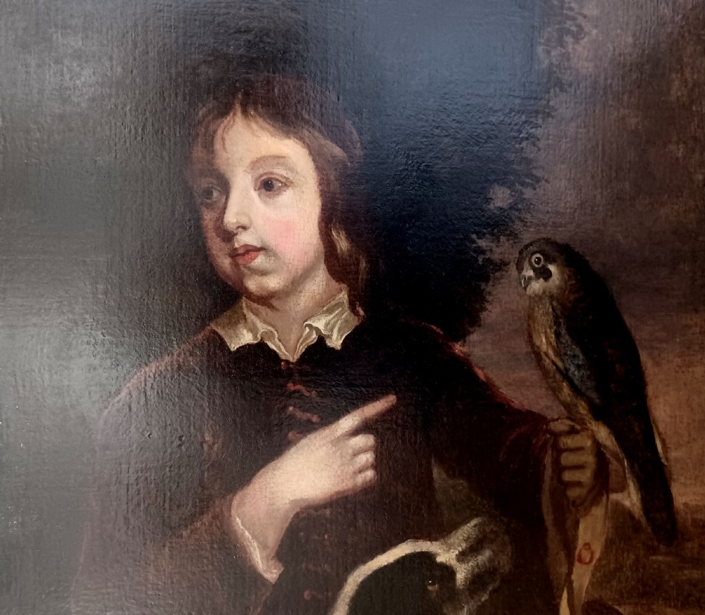 An 18th-century oil painting depicting a young man pointing while holding a falcon on his hand with a spotted hunting dog at his side. View II