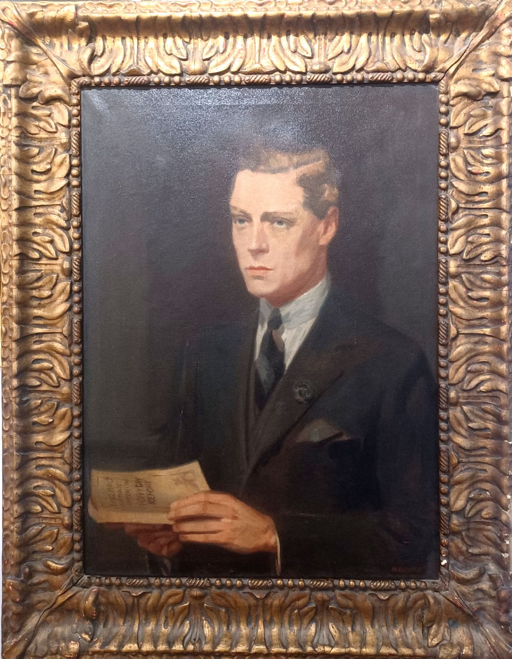 An oil painting on canvas depicting Edward, Prince of Wales, wearing a dark suit with a lapel poppy and holding a paper booklet. View VII