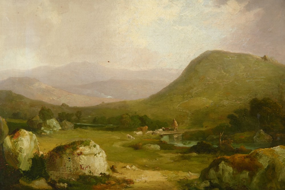 A nineteenth-century oil painting depicts a drover and livestock crossing a small stone bridge over a river in a rugged Dartmoor landscape under an overcast sky.