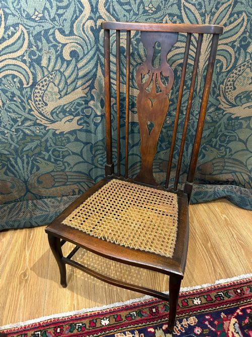 A PAIR OF ARTS AND CRAFTS NURSING CHAIRS - ADDITIONAL PHOTO 9
