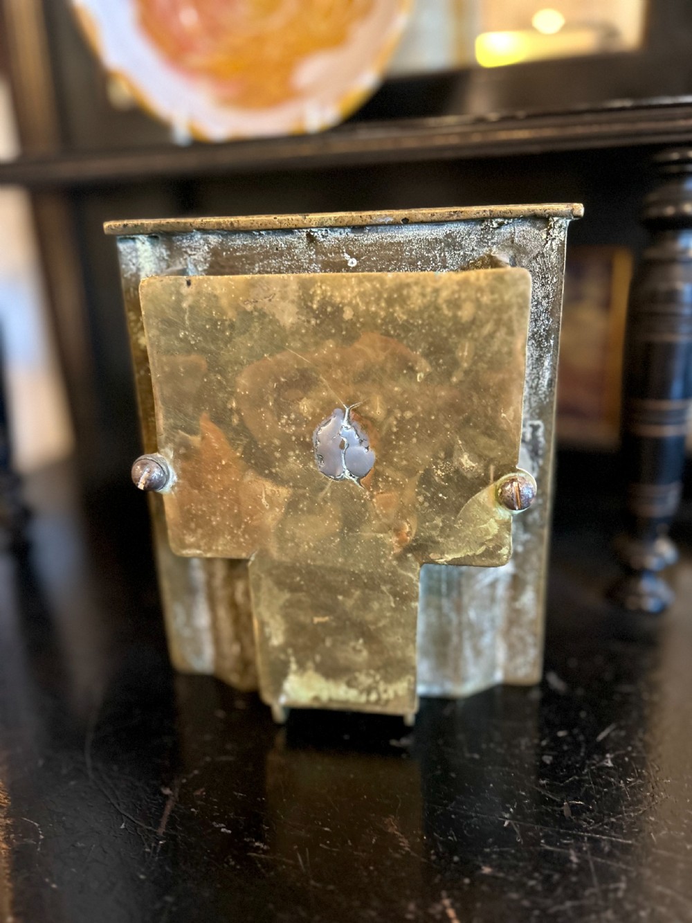 A Victorian brass tradesmans sample fireplace featuring embossed foliage details, a central grate, and a curved fender. View V