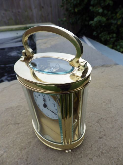 FRENCH OVAL CARRIAGE CLOCK CIRCL 1900 - ADDITIONAL PHOTO 1