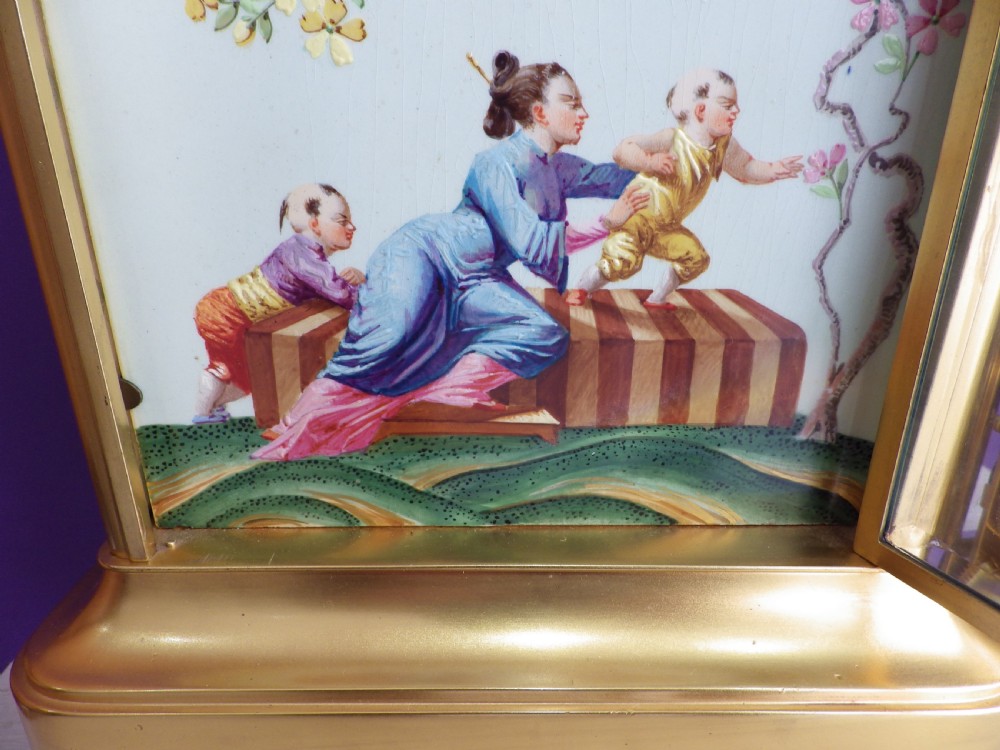 A late 19th-century French gilt brass crystal regulator clock featuring a hand-painted enamel front panel decorated with Chinoiserie figures and floral motifs. View VIII