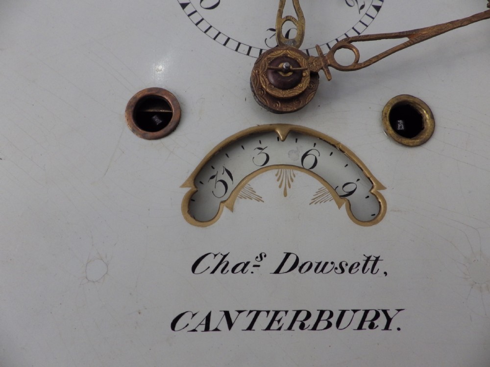 A late 18th-century Georgian mahogany longcase clock featuring a swan-neck pediment and an arched painted dial with moon phase function. View XIV