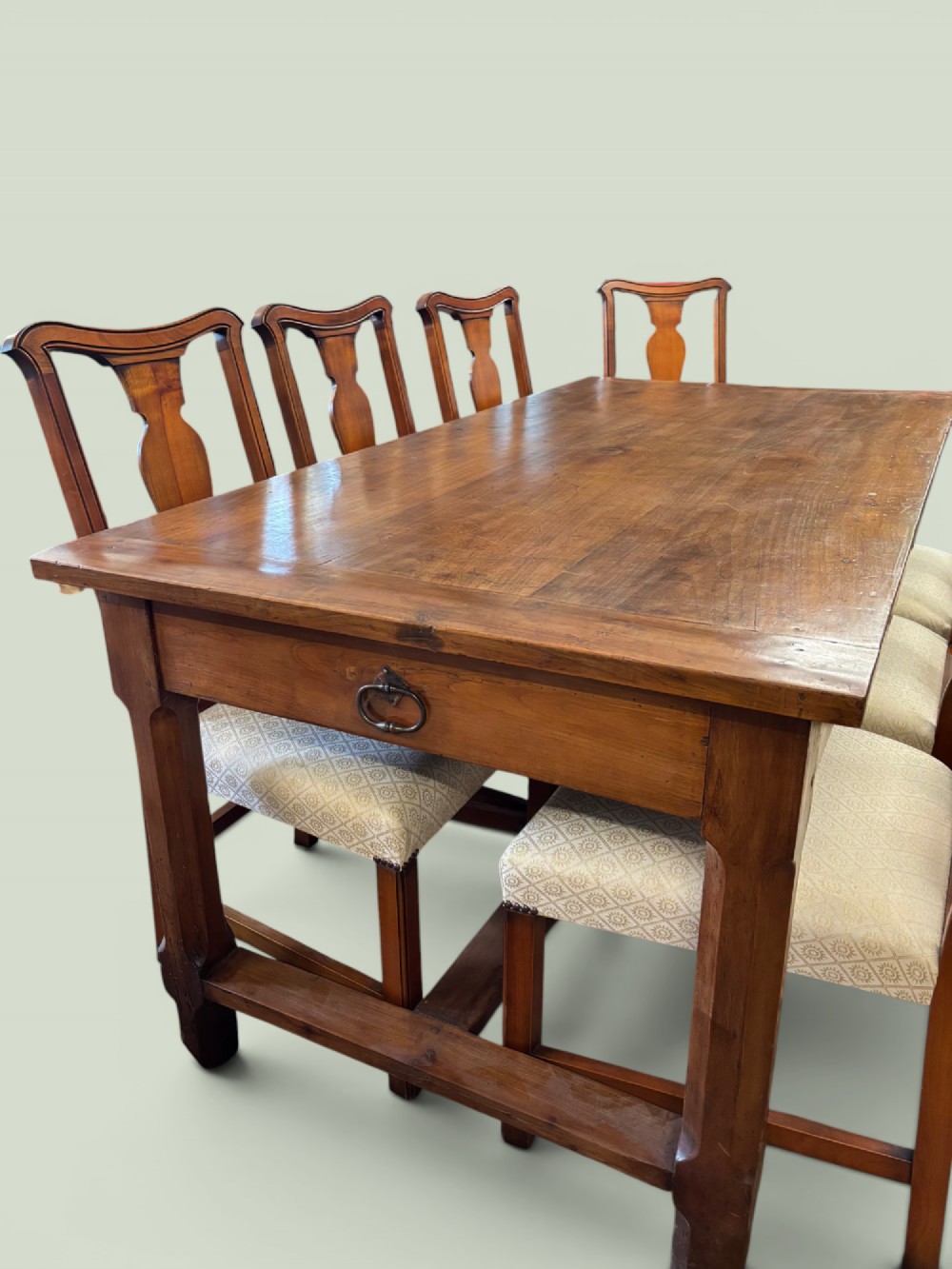 A 19th-century French cherrywood farmhouse table featuring two drawers with iron ring pulls and a sturdy H-stretcher base. View II