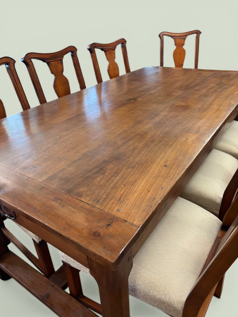 A 19th-century French cherrywood farmhouse table featuring two drawers with iron ring pulls and a sturdy H-stretcher base. View III