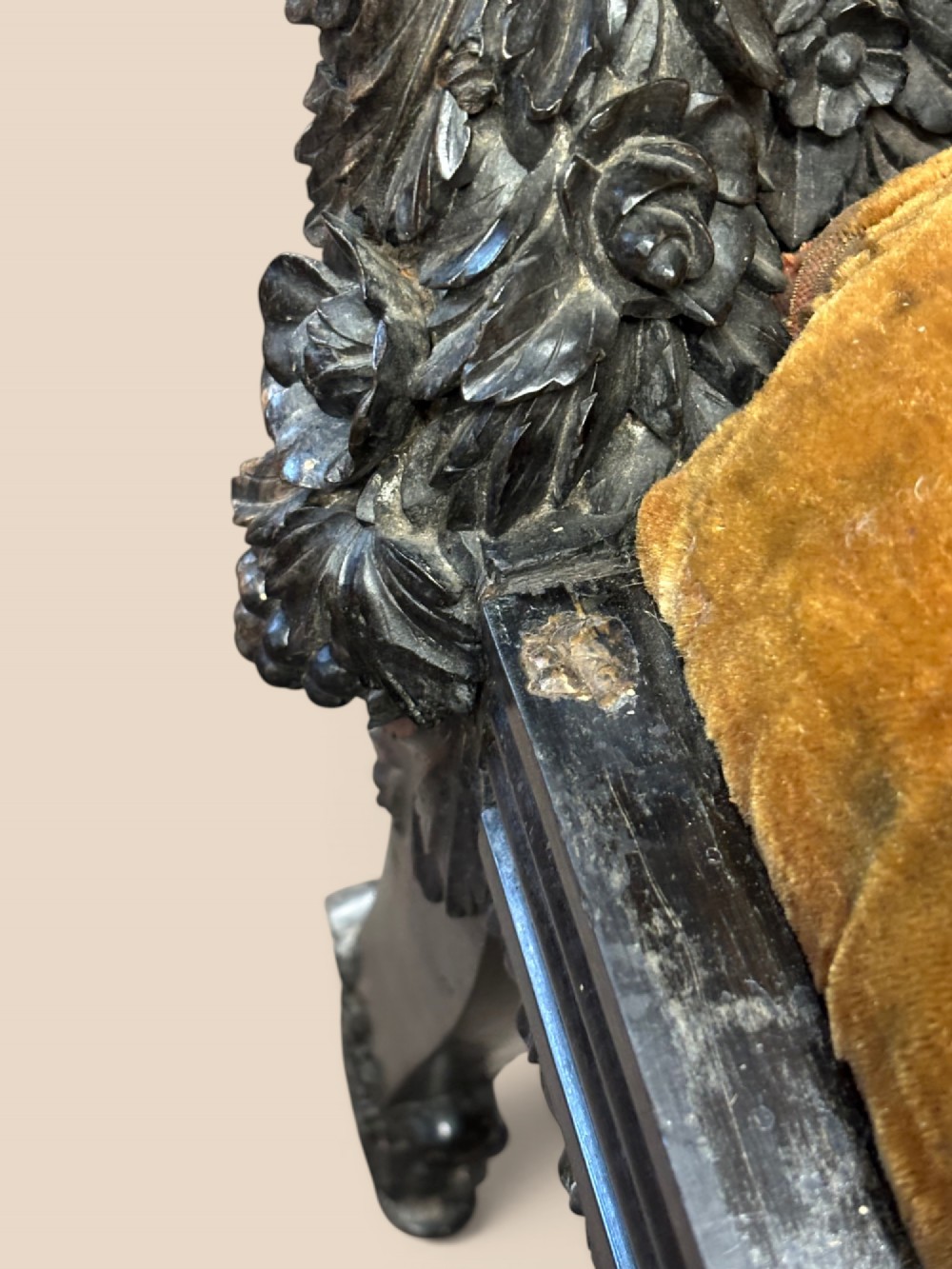 Late 19th-century Anglo-Indian ebony side chair featuring intricate hand-carved floral backrest detailing and floral needlepoint velvet seat. View VIII