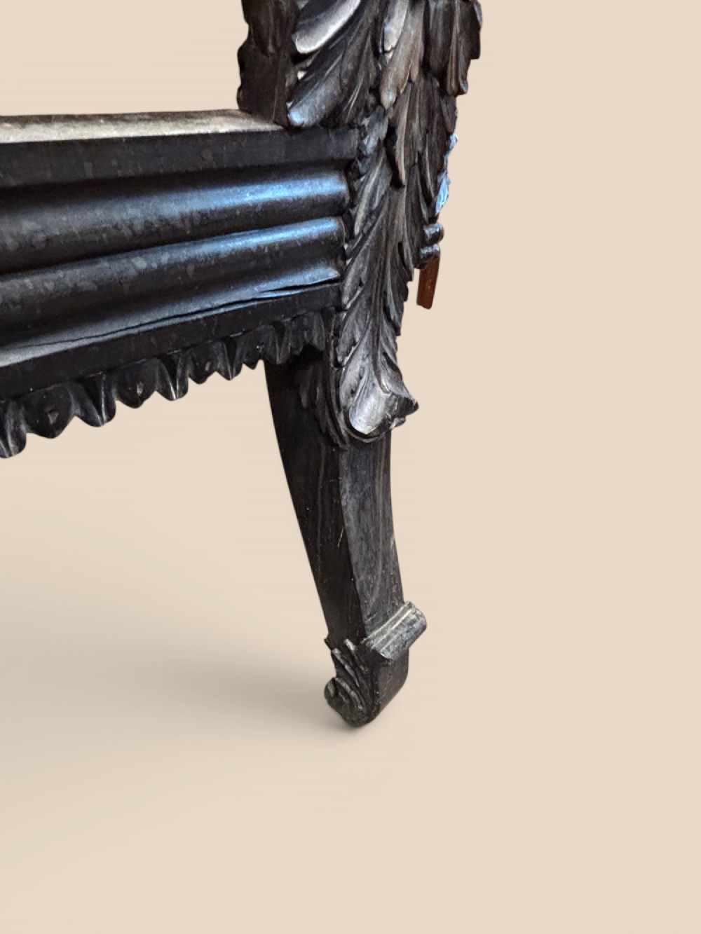 Late 19th-century Anglo-Indian ebony side chair featuring intricate hand-carved floral backrest detailing and floral needlepoint velvet seat. View IX