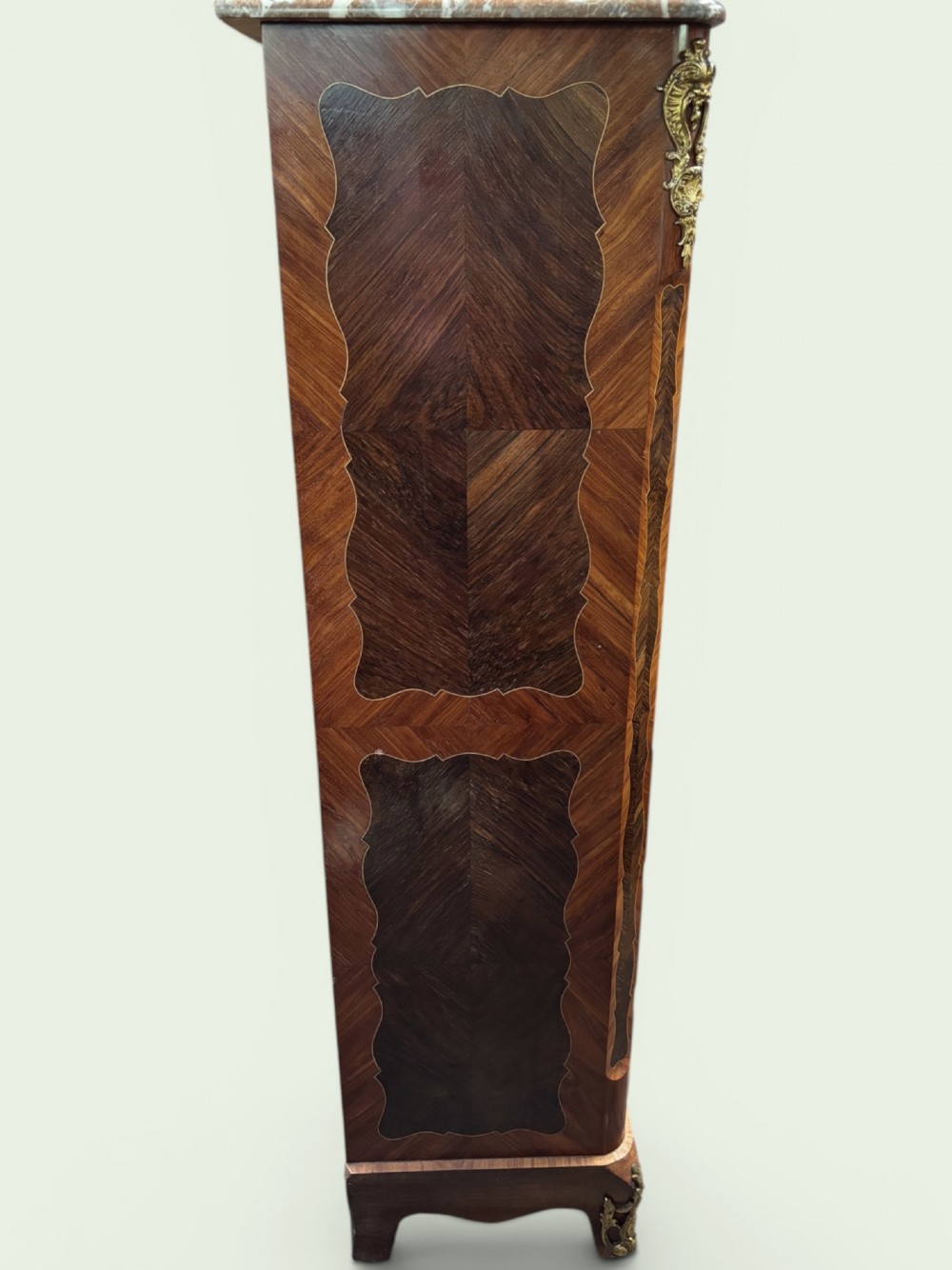 A tall French marquetry secretaire cabinet featuring floral wood inlays, gilt-bronze mounts, four drawers, and a marble top surface. View II