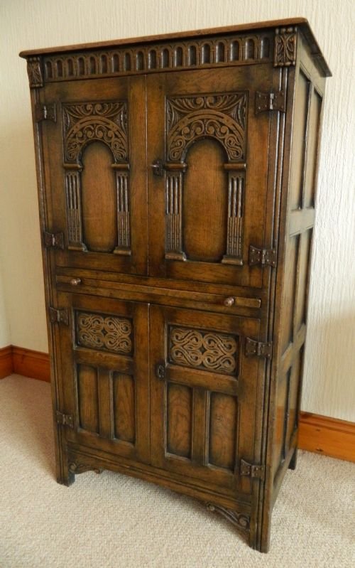 Tall Carved Oak Cupboard