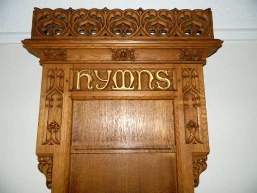 fig 1. carved oak hymn board