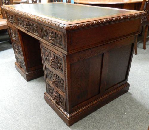 fig 1. carved oak green man desk