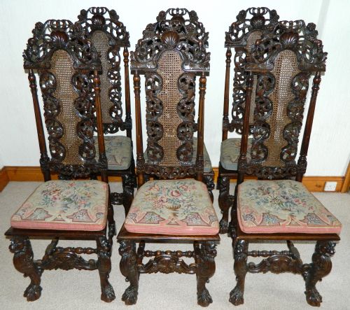 Set of Six Carved Walnut Chairs