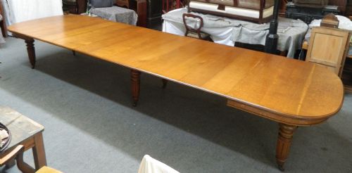 15.5' Extending Oak Dining Table with Leaf Holder