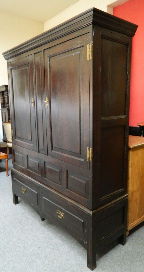 fig 1. oak livery cupboard