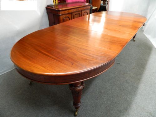 fig 1. large mahogany extending dining table with leaf carrier