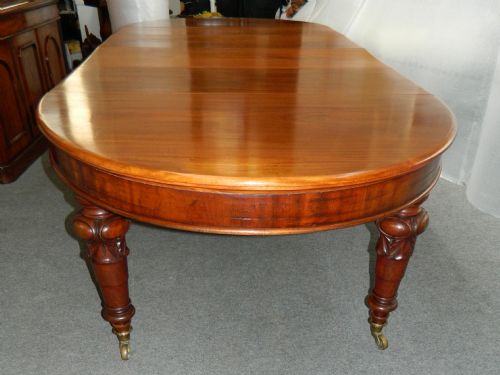 fig 2. large mahogany extending dining table with leaf carrier