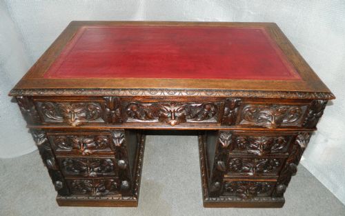 fig 1. carved oak green man desk