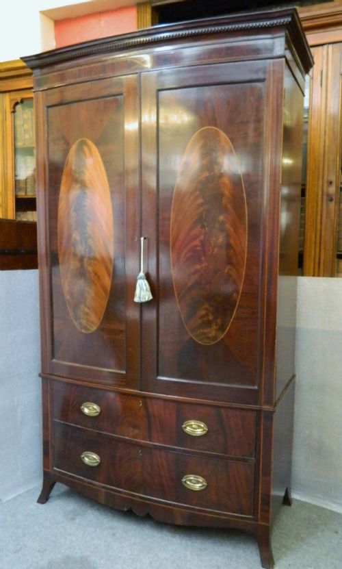fig 1. mahogany bow front linen press