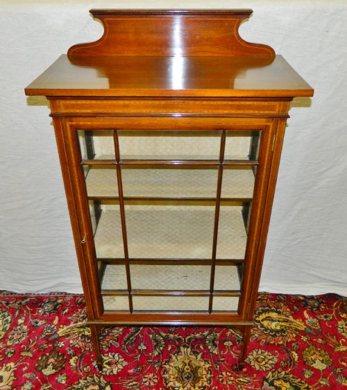 fig 1. inlaid mahogany display cabinet