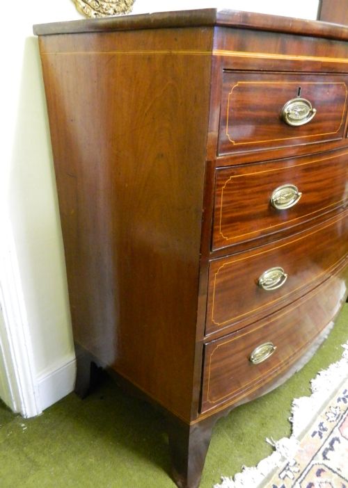 fig 1. Georgian inlaid mahogany bow front chest of drawers