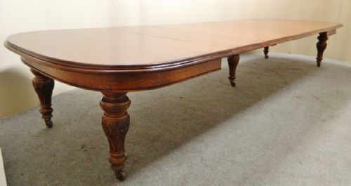 fig 1. 15' extending oak dining table with 5 leaves