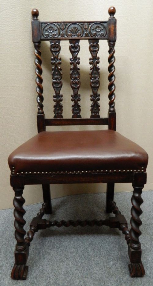 fig 2. set of eight carved oak dining chairs