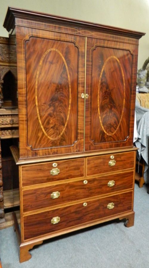 fig 1. inlaid mahogany linen press