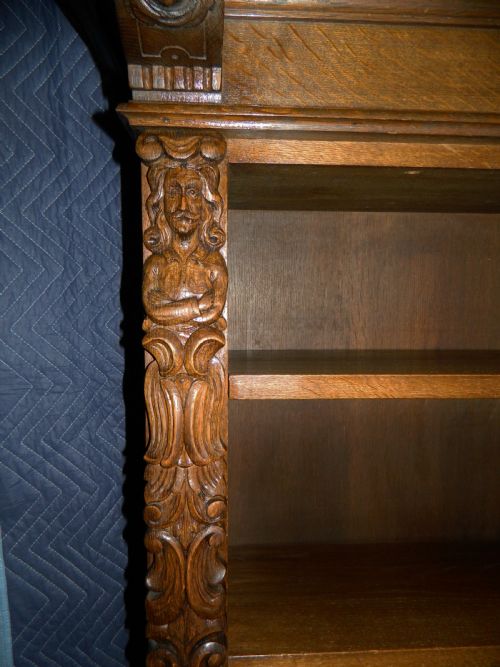 fig 1. tall carved oak bookcase