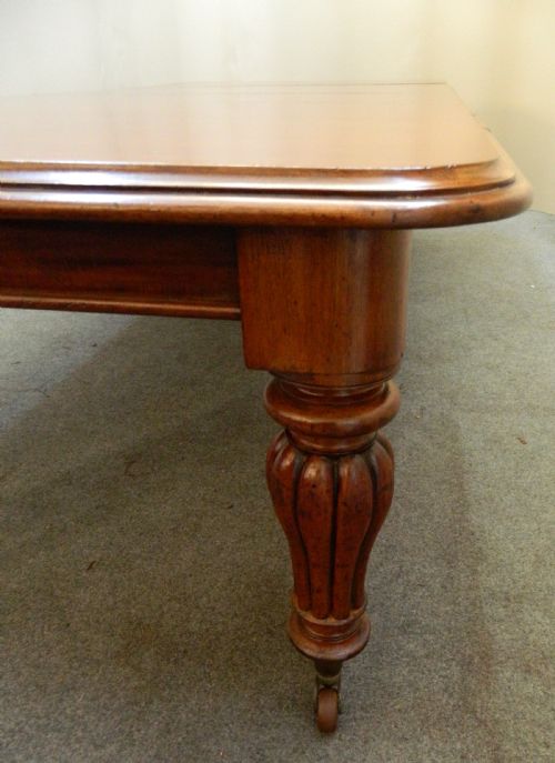 fig 1. large extending mahogany dining table