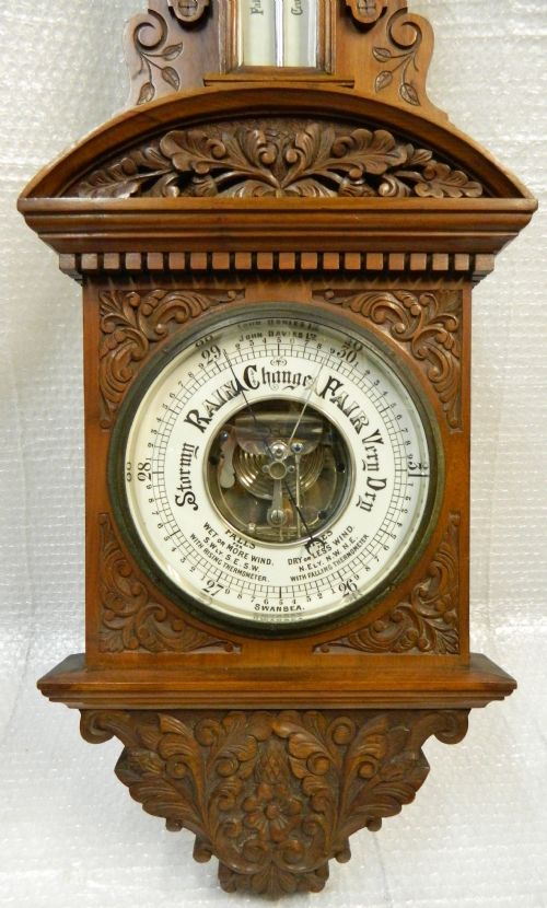 fig 1. large carved aneroid barometer - Davies of Swansea
