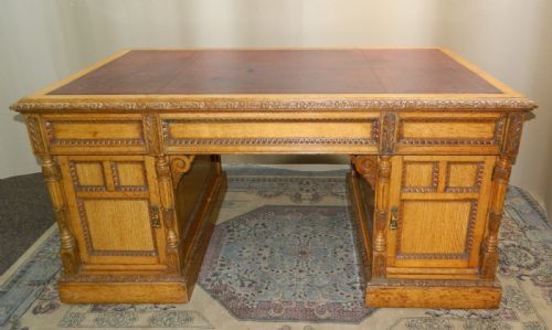 fig 1. oak partners desk by Maple & Co.