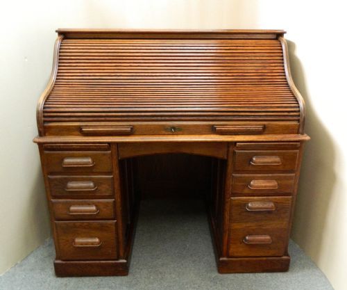 fig 1. oak roll top desk